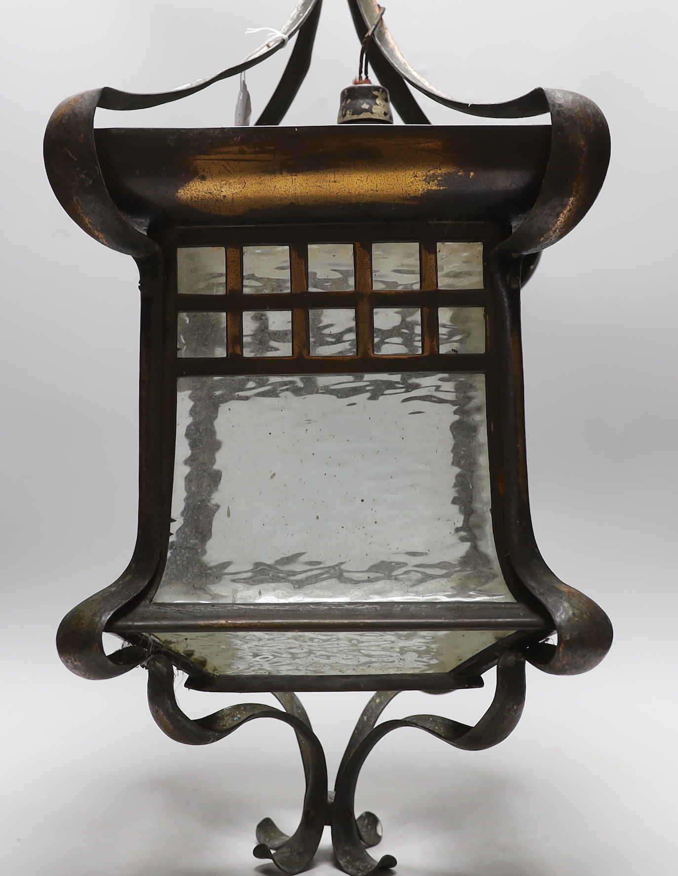 An Art Nouveau copper and glass lantern